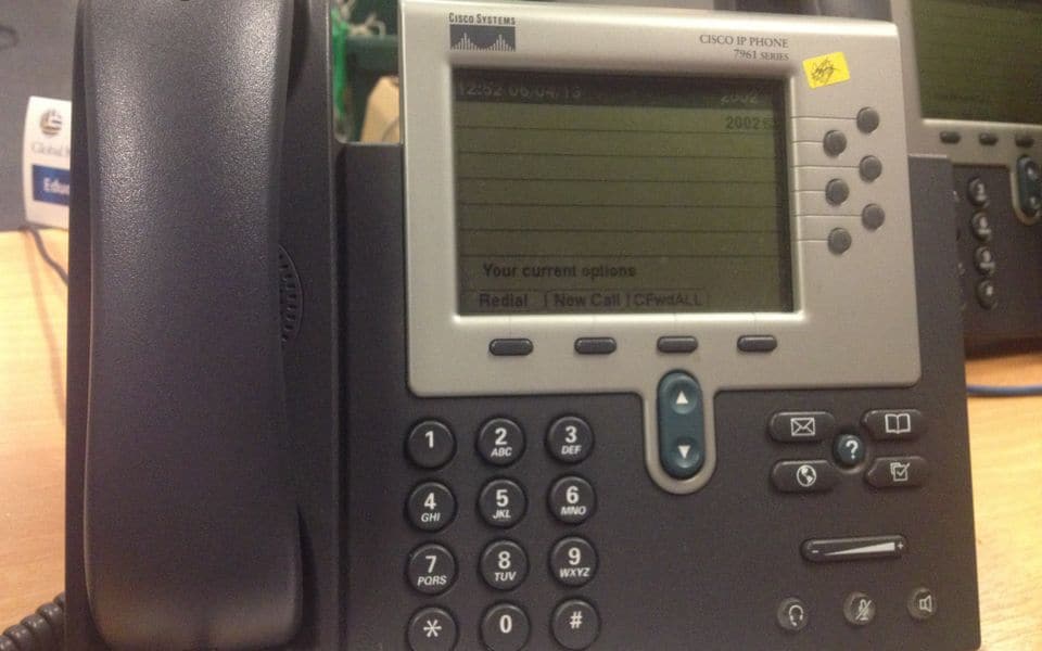 An IP desk phone with a display